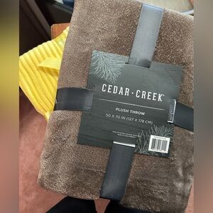 NWT. Two blankets 1) brown with gold specks 1) canary yellow